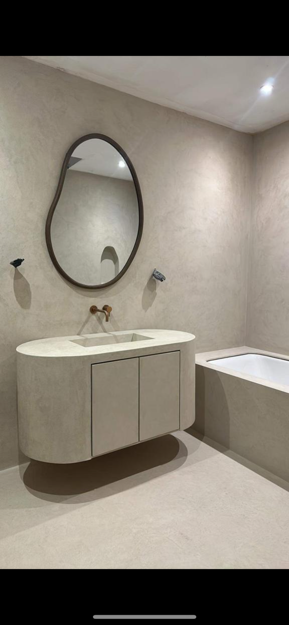 Microcement to walls and floor in this beautiful bathroom.